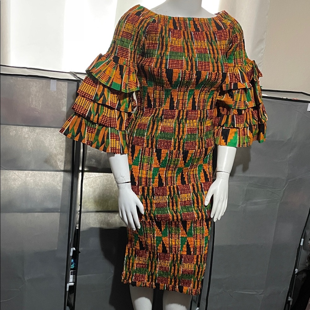 Colorful Patterned Dress with Ruffle Sleeves. Comes with a head piece
